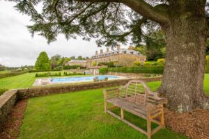 Large garden with bench